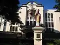 The school, with the statue of its Patron Saint, St. Augustine of Hippo