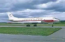 Pre–1975 Czechoslovak Airlines livery, with a feathered-wing-like branched line on fuselage bottom and "wind-swept" serifs