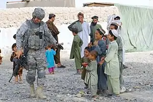 Outgoing 97th MP BN CSM walking streets of Afghanistan