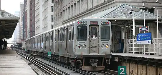 Image 1A Howard bound Red Line train temporarily rerouted to elevated tracks at Randolph station, Chicago. Photo credit: Daniel Schwen (from Portal:Illinois/Selected picture)