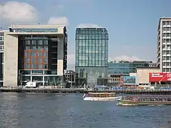 Oosterdokseiland with the Amsterdam Central Library (left) and Amsterdam Conservatory (middle)