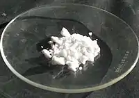 Cadmium chloride hemipentahydrate