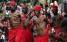 Cakalele dancers wearing traditional clothes