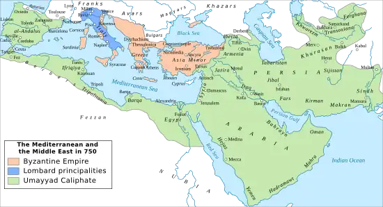 Map of western Eurasia and northern Africa showing the Umayyad Caliphate in green covering most of the Middle East, with the Byzantine Empire outlined in orange and the Lombard principalities in blue