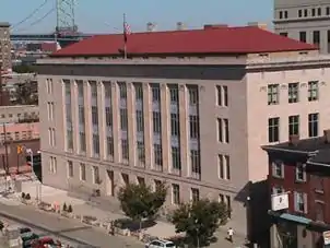 Image 44Federal Courthouse in Camden, which is connected to Philadelphia via the Benjamin Franklin Bridge in the background (from New Jersey)