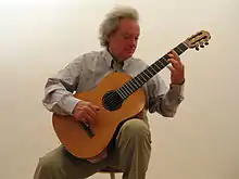 Domeniconi with a Luigi Mozzani guitar from 1938