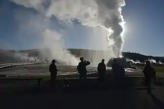 The sun behind Castle Geyser, 2019.