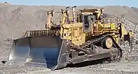 Caterpillar D11N with a double shank ripper