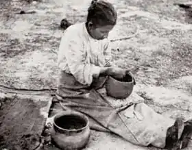 A Catawba potter making an olla, 1908