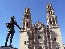 Image 21Chihuahua Cathedral and a monument to the city's founder, Antonio Deza y Ulloa (from History of Mexico)