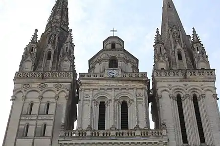 Upper levels of the three towers: Gothic left and right, Renaissance crown in center (16th c.)