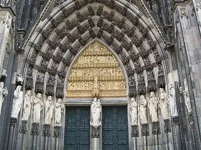 The main entrance shows the 19th century decoration.