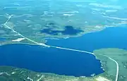 Causeway across Parsnip Reach of Williston Lake opened in 2000 to shorten the Log Haul Distance