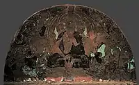 Cave 69, lunette over the front door: the Buddha preaching at Sarnath (佛鹿野苑初转法轮) with King Suvarnapusa and his Queen as attendants.