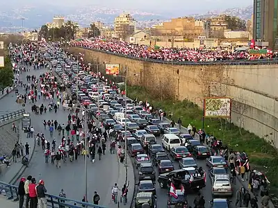 Image 5Anti-Syrian protesters heading to Martyrs' Square in Beirut on foot and in vehicles, 13 March 2005 (from History of Lebanon)