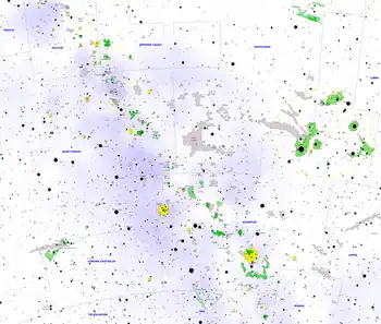 A starchart of the Galactic Center area, with the Rho Ophiuchi cloud complex marked as large green area in the middle of the right half of the chart.