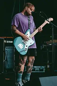 Chadwick Johnson performing live with Hundredth in 2017.