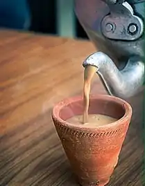 Image 6Indian Masala chai served in a red clay tea cup. (from List of national drinks)