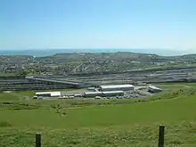 Image 26Credit: StephenDawson The Channel Tunnel terminal at Cheriton near Folkestone in Kent, from the Pilgrims' Way on the escarpment on the southern edge of Cheriton Hill, part of the North Downs.More about the Channel Tunnel... (from Portal:Kent/Selected pictures)