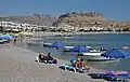 Plage, in the background is visible Feraclos Castle