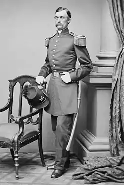 A Captain the United States Army during the 1860s wearing the long tunic or "frock coat" adopted in 1851.