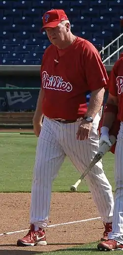 Photograph of Charlie Manuel, Phillies' manager from 2005 to 2013 walking along a base line