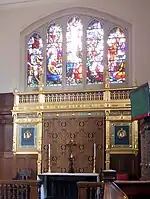 Altar in the south aisle of the Chapel