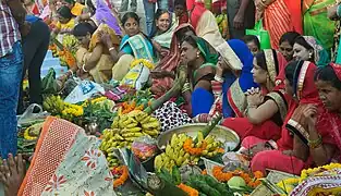 Women waiting with Prasada for offerings