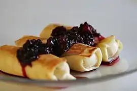 Cheese blintzes with blackberry preserves