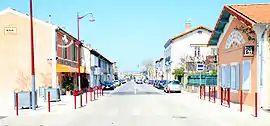 The main road in the village of Cheval-Blanc