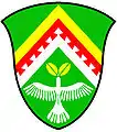 a chevron enhanced - Vert; a chevron enhanced, per chevron or and argent, over the partition line another, the lower edge dovetailed, gules, in base a dove ascending argent, holding in its beak two leaves or - Kwnanonzame Town Committee, RSA