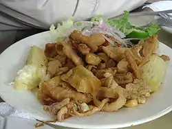 Image 4Chicharrón mixto, is a common dish in the country derived from Andalusia in southern Spain. (from Culture of the Dominican Republic)