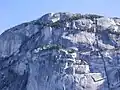 The Chief's Grand Wall area, a vertical sea of some of the world's finest granite. To the right the Black Dyke can be seen bisecting the rock face.