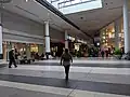 The mall on September 9, 2019, showing Zara, Lammle's (closed), Orange Julius Bell, H&M, Chapters, and the Scotiabank Theatre.