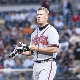 A baseball player in gray