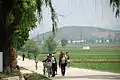 Cyclists in Chongsan-ri, Kangso, 2008