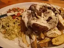 Image 49Pork chop with plantain chips. (from Honduran cuisine)