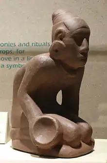 The "Chunkey Player" statuette, made of Missouri flint clay, depicts the ancient Native American game of chunkey. The statuette is believed to have been originally crafted at or near Cahokia Mounds; it was excavated at a Mississippian site in Muskogee County, Oklahoma, revealing the reach of the trade network of this culture.