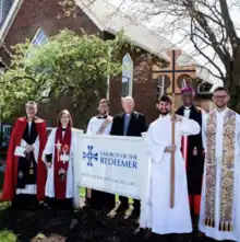  Archbishop of Rwanda Laurent Mbanda (second from right) consecrates the Church of the Redeemer (ACNA) in Highwood, Illinois, in 2019.