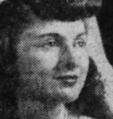 Bridal photo of a young white woman with dark hair.