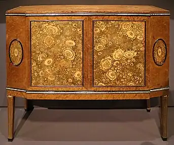 Chest of drawers, a highly simplified reinterpretation of the Louis XVI style; by Clément Mère; 1910; maple, ebony, leather and ivory; 87.5 x 96 x 37 cm; Musée d'Orsay, Paris