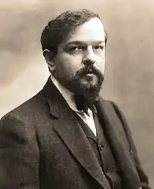 head and shoulders photograph of middle-aged, white, dark-haired, bearded man