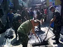 Army Reservists from the 20IB(RR) conduct Clean-up Drive (CMO) at Bgy Old Capitol Site, QC.