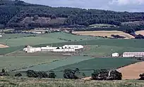  This photograph was taken in the late 1970s from Tertowie farm. The wooded hill in the distance is Tyrebagger Hill.