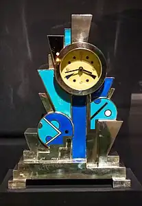 Constructivist influences – Clock, decorated with flat geometric shapes, by Jean Goulden (1928), silvered bronze with enamel, Stephen E. Kelly Collection