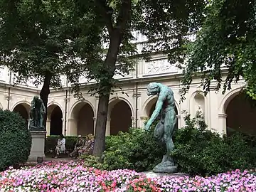 Foreground : The shadow or Adam by Rodin; background Democrites meditating on the seat of the soul