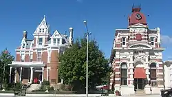 Street view of the Aaron G. Cloud House and the Cloud State Bank, located at 164 and 108 S. Washington Street in McLeansboro