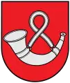 A coat of arms depicting a rounded, silver horn hung up by a rounded, silver strap all on a solid red background bordered by a black line