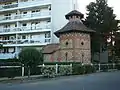 Dovecote (colombier), a remnant of the village surrounded by 20 large houses, now surrounded by apartment blocks