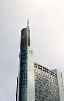 Close-up of the spire. Steam escapes from vents that are integrated into the spire cladding.